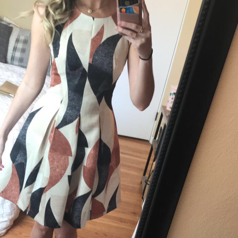 Textured and lined geometric neutral dress